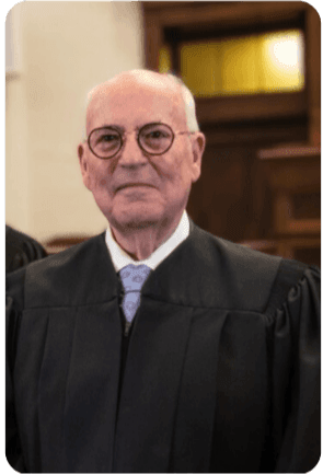 Judge standing in courtroom